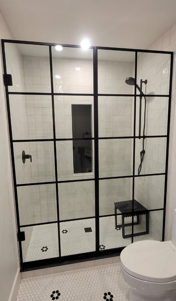 Black grid-style framed shower enclosure in Waterloo